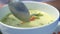 Close up of Thai meal kit green curry chicken soup eating in slow motion. 1920x1080