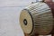 Close-up of Thai musical instruments, wooden drums made of animal skin.
