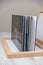 Close up of thick and rigid wedding album pages in a book with acrylic cover