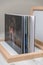 Close up of thick and rigid wedding album pages in a book with acrylic cover