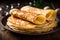 Close up of thin pancakes stacked on a rustic wooden plate