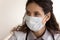 Close up thoughtful female doctor wearing medical face mask