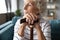 Close up thoughtful older woman holding hands on wooden cane