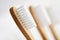 Close up of three bamboo toothbrushes