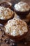 A close up of three bowls filled with whipped cream and chocolate chips, AI