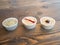 Close up of three cupcakes on a wooden background