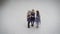 Close up of three happy female friends standing together and looking at the telephone. girls are celebrating