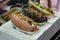 Close up on three type of vegan hot dogs