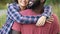 Close-up of thrilled boyfriend and girlfriend demonstrating shining white teeth