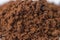Close -up to brown granulate of instant coffee