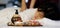 Close-up to focus massage equipment, wooden pump oil massage, wooden bowl, and flowers on wooden plates. And asian woman sleep