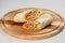 Close up to Grilled Meat shawarma served on wooden plate, isolated on background.