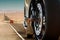 Close-up to a motorcycle in a road at the desert