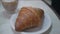 close up to a plate of fresh french croissant bakery with selective focusing for breakfast