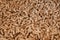 Close up to Wood Pellet pile for alternative energy power, raw material background