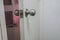 Close up toilet doorknob at home
