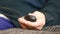 Close-up of a tonometer pump in the hands of an elderly person who independently measures blood pressure. Blood pressure control i