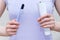 Close-up of a toothbrush and paste in the hands of Caucasian woman