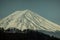 Close up top of Fuji mountain with snow cover on the top with could, fujisan