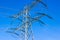 Close-up of the top of a huge high-voltage electric tower