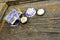 Close up, top shot of assorted organic, handmade, botanical flower shape soaps with lavender, rosemary, purple ribbon on rustic