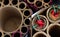 Close-up and top view of partially burned-down fireworks that are left after the Sylvester night or party, with duds in a