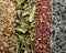 Close-up top view photo of dried robinia, linden, tea rose petals, sagebrush.