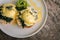 Close up top view Poached Egg with spinach, avocado and Bread Toast on wooden table. Healthy food and diet concept