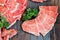 Close-up top view of Premium Rare Slices many parts of Wagyu A5 beef with high-marbled texture on stone plate served for Yakiniku.