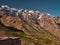 Close up of tourist on the terrace of a building in traditional moroccan mountain village Tacheddirt