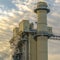 Close up of the tower and building with walkway at a Utah Valley Power Plant