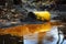 close-up of toxic waste spill, with hazardous chemicals seeping into the environment