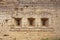 Close up of traces of bullets on fortress wall