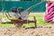 Close up of a tractor motoblock  plowing the field