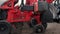 Close-up, tractor with special precision planters, seeder is working in the field, agricultural machinery is planting