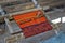 Close-up of traditional Aymara weaving in the making on an old fashioned wooden loom