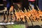Close up of traditional barbecue street food with fishes and chicken intestines on skewers over charcoal grill - Vang Vieng, Laos