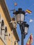 Close-up of traditional cast iron street lamps. Village in Spain.