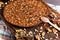 Close up of traditional castagnaccio cake, a classic italian gluten free autumn cake on wooden table made with chestnuts flour,