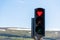 Close up of traffic lights with a red heart-shaped signal
