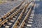 Close up of train or railroad tracks with cement backing In the countryside