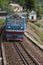 Close up of a train running on the railway over Hai Van mountain pass in the central Vietnam