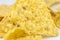 Close up, Triangular chips, mexican nachos, on white background. Perfect Tasty spicy snack for a beer