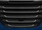 Close up truck cabin radiator cover with grid grille. Car radiator grille background pattern. Industrial pattern truck grill grid