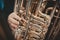 Close-up on the Tuba in the foreground - the tin dentistry instrument