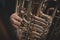 Close-up on the Tuba in the foreground - the tin dentistry instrument