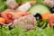 Close up tuna salad with tomatoes and olives