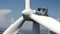 Close up of the turbine of a windmill against the blue sky