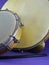 Close-up of two Brazilian musical percussion instruments: pandeiro a type of tambourine and tamborim.