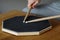 Close up of two drumming sticks on a practice pad at home